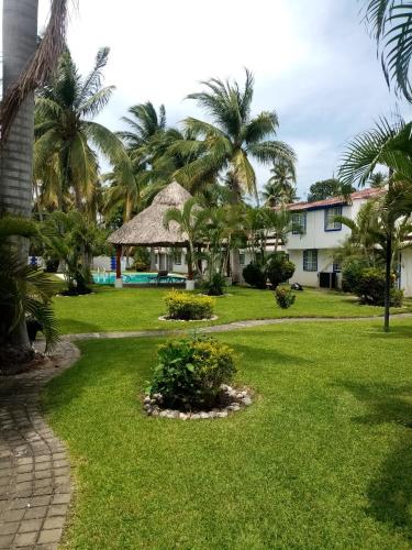 a view of the resort from the garden at Casa en la zona de Acapulco diamante in La Sabana
