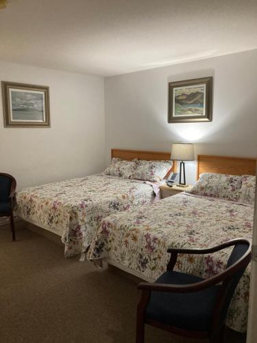 Postel nebo postele na pokoji v ubytování Motel 99