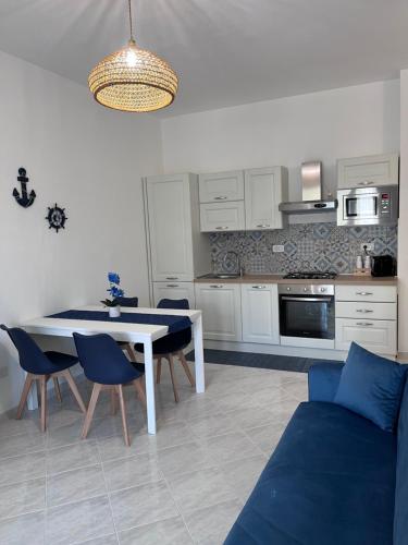 Køkken eller tekøkken på Appartamento TERRAZZA SALENTINA con BOX AUTO