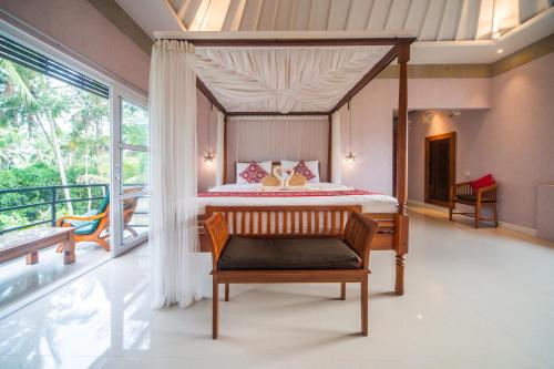 Voodi või voodid majutusasutuse Casa Priya Ubud toas