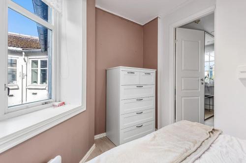 Postel nebo postele na pokoji v ubytování Classic & cozy Apartment in Ila near city center