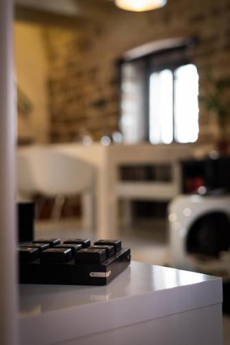 a black keyboard sitting on top of a counter at Apartment Capo Family & Capo Studio -Old Town-Parking in Trogir