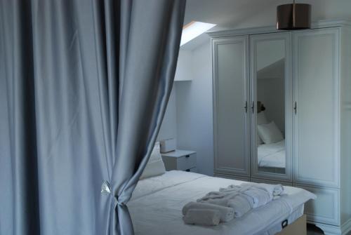 Postel nebo postele na pokoji v ubytování Rustico apartments