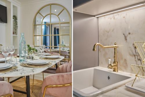 - une salle à manger avec une table et un lavabo dans l'établissement Apartment Saint Germain des Près by Studio prestige, à Paris