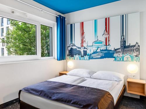 Posteľ alebo postele v izbe v ubytovaní B&B Hotel Hamburg City-Ost