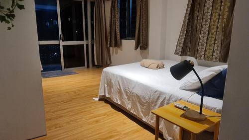 Ein Bett oder Betten in einem Zimmer der Unterkunft Spacious 3 BRM Apartment