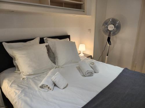 Säng eller sängar i ett rum på La Madeleine - Strasbourg