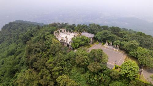 an aerial view of a building on top of a mountain at Melia Ba Vi Mountain Retreat in Hanoi