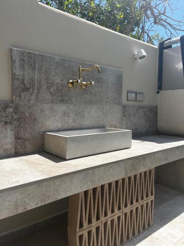 a sink on a counter in a bathroom at Villa Marina Blu by Le Dune Villas in Porto Cesareo