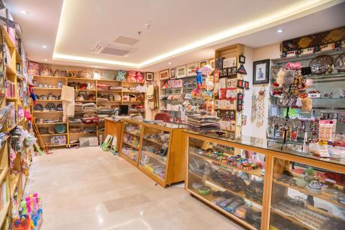 a store filled with lots of items on display at Ramada by Wyndham Murree Lower Topa Resort in Murree