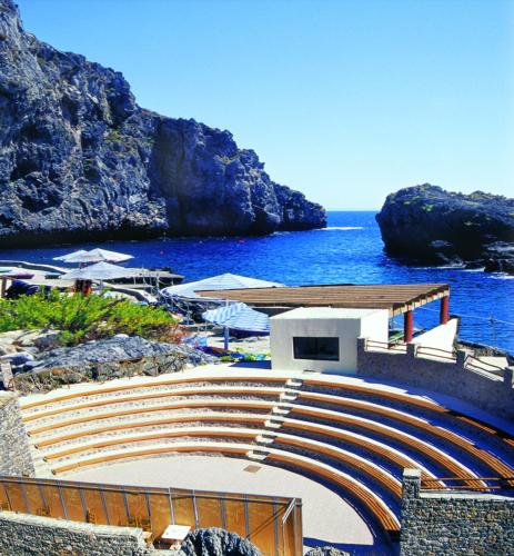 a view of a beach with the ocean at Kalypso Cretan Village Resort & Spa in Plakias
