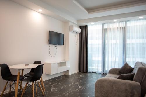 Una televisión o centro de entretenimiento en BVL Apartments
