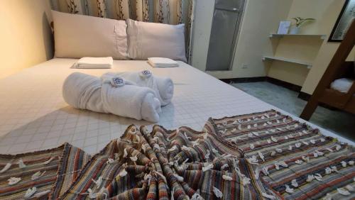 Ein Bett oder Betten in einem Zimmer der Unterkunft PARB Tuguegarao