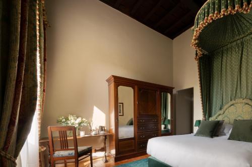 Cama o camas de una habitación en Loggiato Dei Serviti