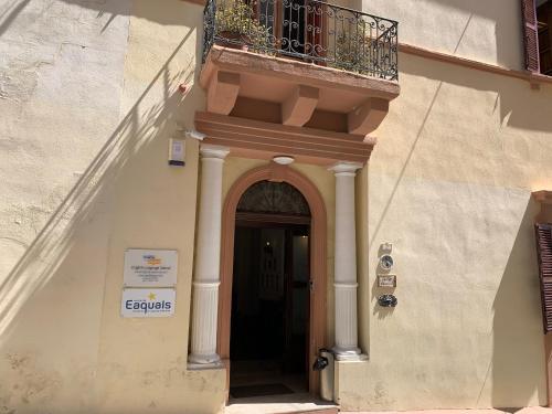 an entrance to a building with a balcony and a door at St Julians Apartment 2 in St Julian's