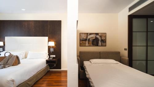 a hotel room with two beds at Hotel Taburiente S.C.Tenerife in Santa Cruz de Tenerife