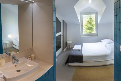 En eller flere senge i et værelse på Apartment for six people Jezera