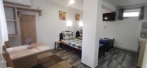 a living room with a couch and a table at ANA in Gračac