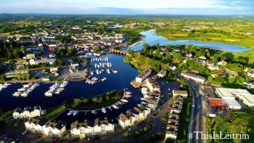 an aerial view of a harbor with boats in the water at Rowing club house in Carrick on Shannon