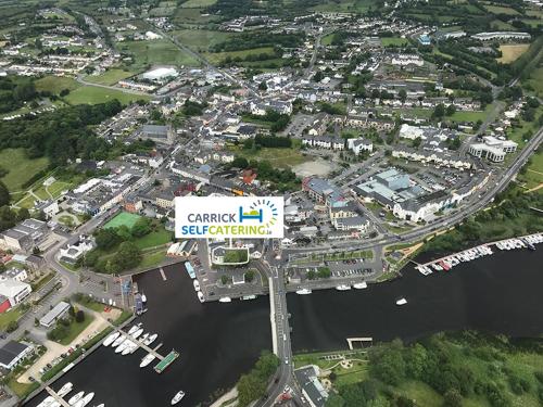 an overhead view of a city with a sign at Rowing club house in Carrick on Shannon