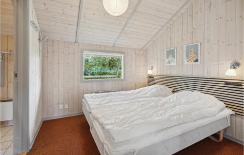 a bedroom with a large white bed in a room at Awesome Home In Haderslev With Kitchen in Haderslev