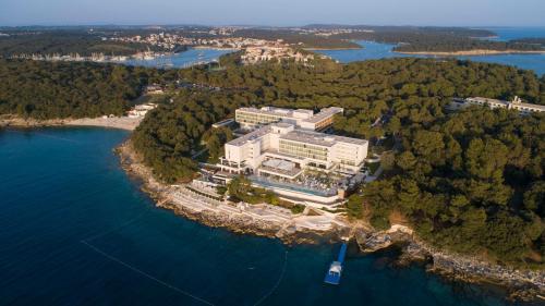 an aerial view of a building on an island in the water at Grand Hotel Brioni Pula, A Radisson Collection Hotel in Pula
