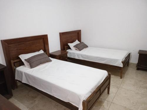 Ένα ή περισσότερα κρεβάτια σε δωμάτιο στο el mistol