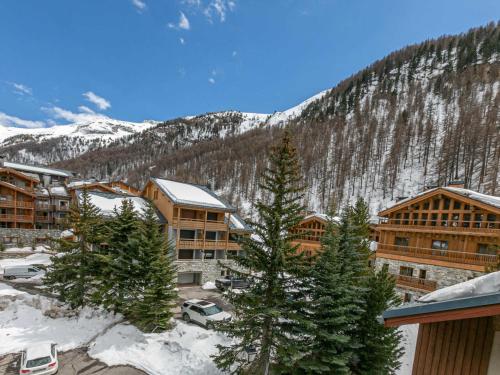 Duplex élégant à Val-d'Isère : Wifi, parking couvert, proche commodités et navette