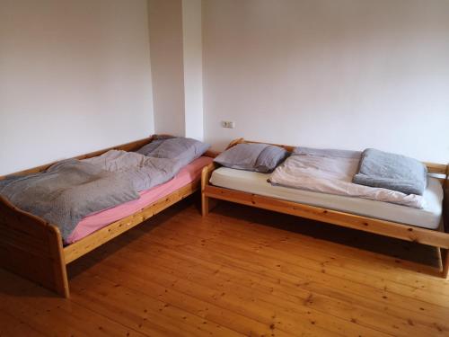 Кровать или кровати в номере Ferienwohnung Niklas