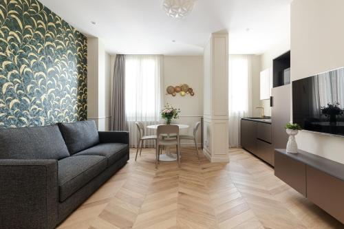 Televisyen dan/atau pusat hiburan di Casa Duomo Luxury Suites