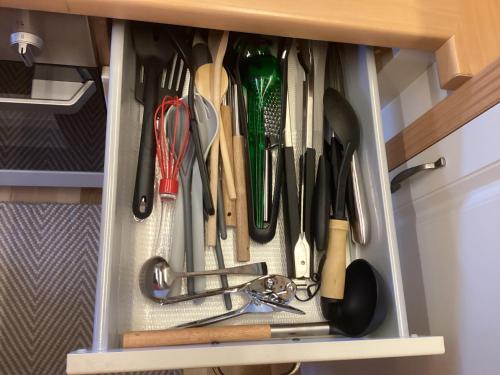 a drawer filled with lots of cooking utensils at Chalet Spessart in Dammbach