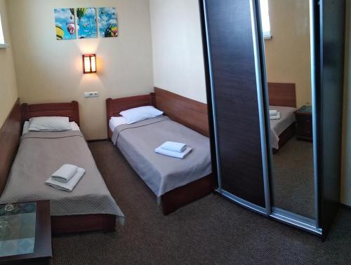 Postel nebo postele na pokoji v ubytování Hotel Marinara