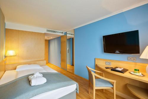 TV/Unterhaltungsangebot in der Unterkunft Austria Trend Hotel Ananas Wien