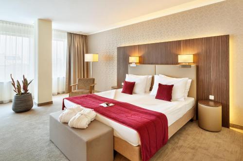 Postel nebo postele na pokoji v ubytování Hotel Schillerpark Linz, a member of Radisson Individuals