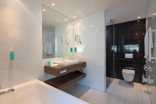 Ένα μπάνιο στο Austria Trend Hotel Doppio Wien