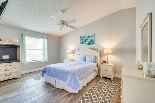 a bedroom with a bed and a ceiling fan at The Villages Abode with Community Pools, Golf and More in The Villages
