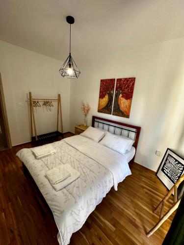 Cama o camas de una habitación en Sunflower suite Trikala