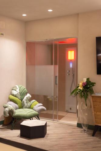 TV a/nebo společenská místnost v ubytování Corte Rossetti Relax Assoluto e Luxury Urban Spa