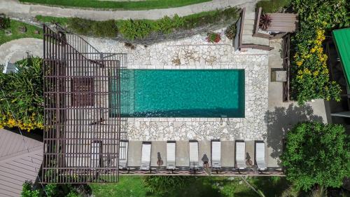an overhead view of a swimming pool on a building at Casa Grande Mountain Retreat - Adults Only in Utuado