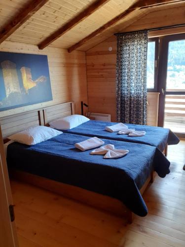 Postel nebo postele na pokoji v ubytování Villa Dabderr Mestia