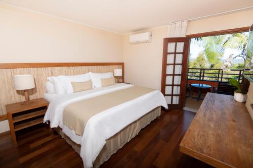 Postel nebo postele na pokoji v ubytování Hotel Villa Rossa