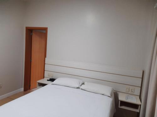 Ένα ή περισσότερα κρεβάτια σε δωμάτιο στο Thile Park Hotel