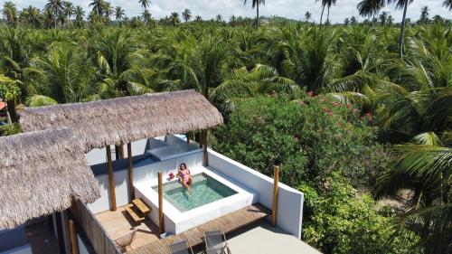 an aerial view of a villa with a swimming pool at Villas Taturé in São Miguel dos Milagres
