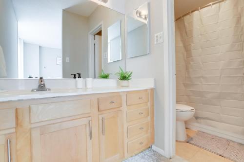 a bathroom with a sink and a toilet at Style & Fantastic Apartment in Crystal City! in Arlington