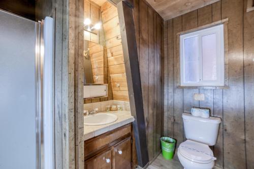 a bathroom with a toilet and a sink at 2 bedroom and Loft, 2 bath, sleeps 6 Donner Lakefront with private dock DLR#013 in Truckee