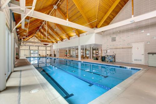 an indoor pool with a large swimming pool at Bear Trap Dunes---26 Willow Oak Ave in Ocean View