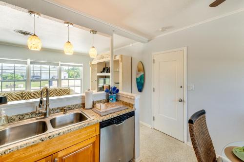 a kitchen with a sink and a dishwasher at Pet-Friendly Venice Vacation Rental, 3 Mi to Beach in Venice