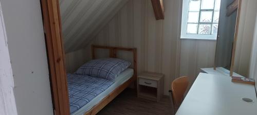 Ένα ή περισσότερα κρεβάτια σε δωμάτιο στο Ferienhaus Kastanienblick