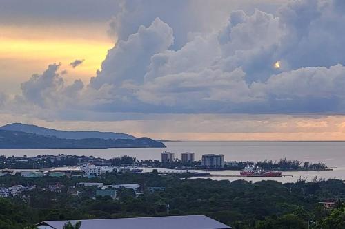 a view of a city and a body of water at victory Luxury Suites in Montego Bay