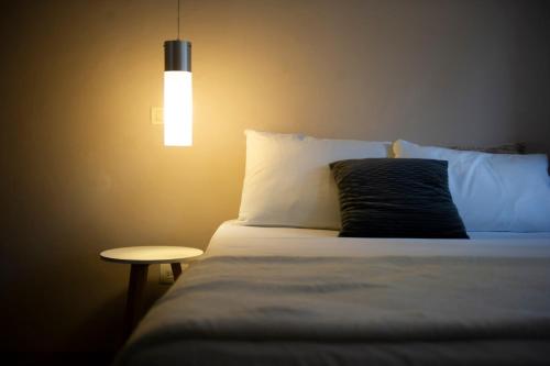 Postel nebo postele na pokoji v ubytování Hotel Internacional